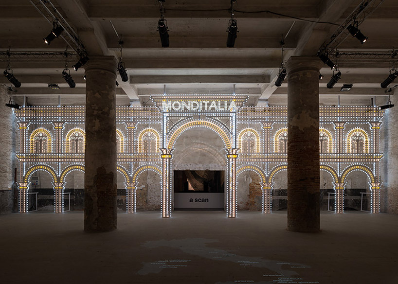 rem koolhaas frames monditalia entrance with swarovski-encrusted luminaire