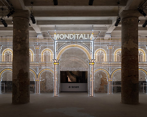 rem koolhaas frames monditalia entrance with swarovski-encrusted luminaire