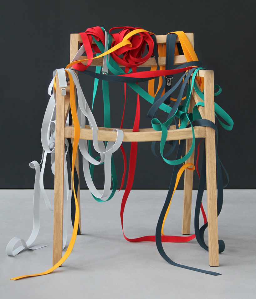 luca martorano + georg muehlamm wrap wooden chair with suspenders