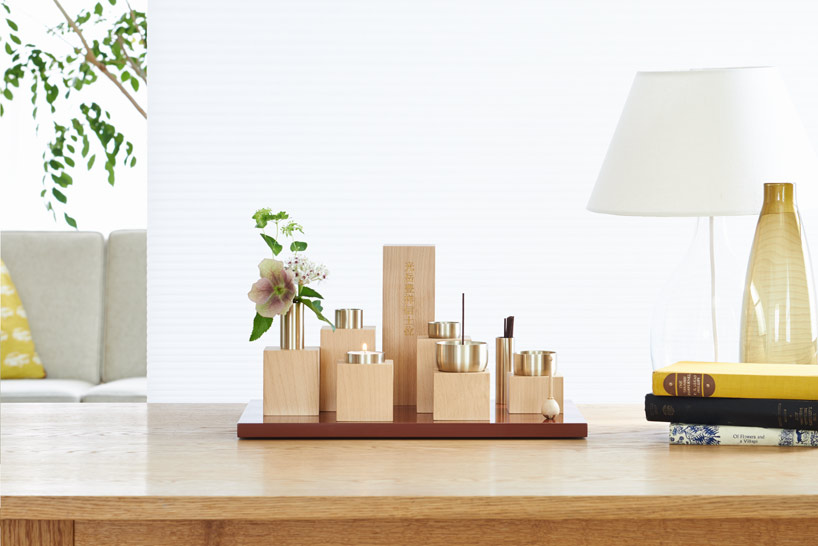 handcrafted buddhist altar table by torafu architects