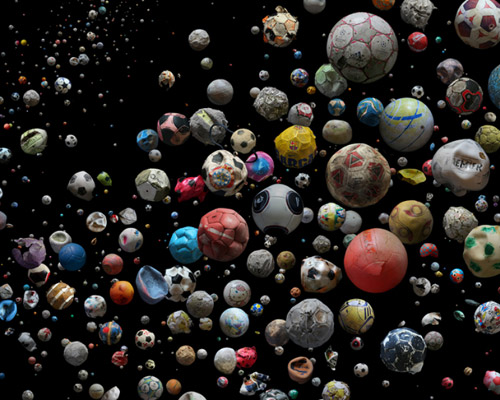 mandy barker recomposes 769 washed-up footballs to highlight marine pollution 