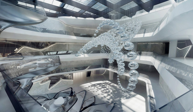 vertical cafe rises through opus dubai hotel by zaha hadid