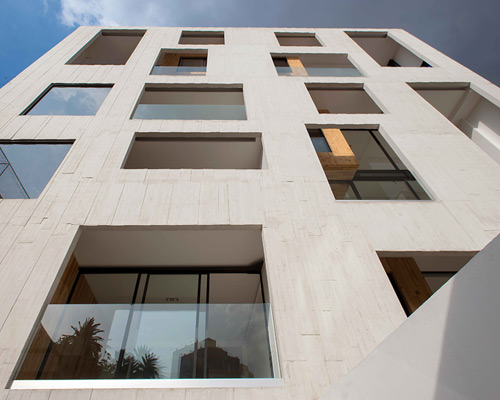 outer concrete shell covers amsterdam 169 apartments by JSa in mexico