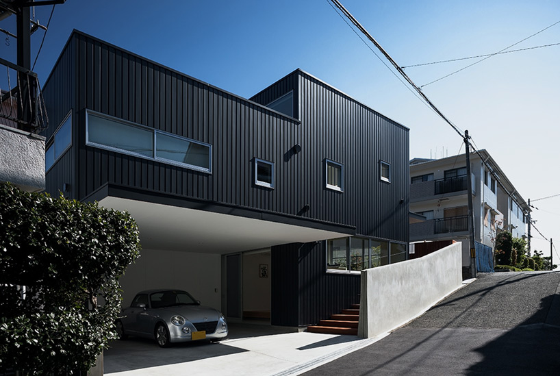 UZU architects disguises swallow house in suburban japan