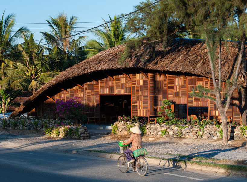 a21studio builds salvaged ring coffee shop from recycled wood