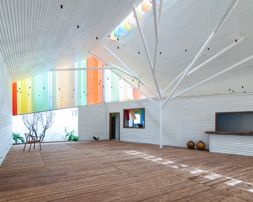 a21studio shades the chapel with colorful curtains in ho chi minh city