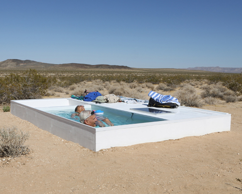 alfredo barsuglia sites social pool in remote area of the mojave desert