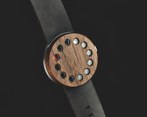 wooden analog watch by grovemade displays time through glass windows