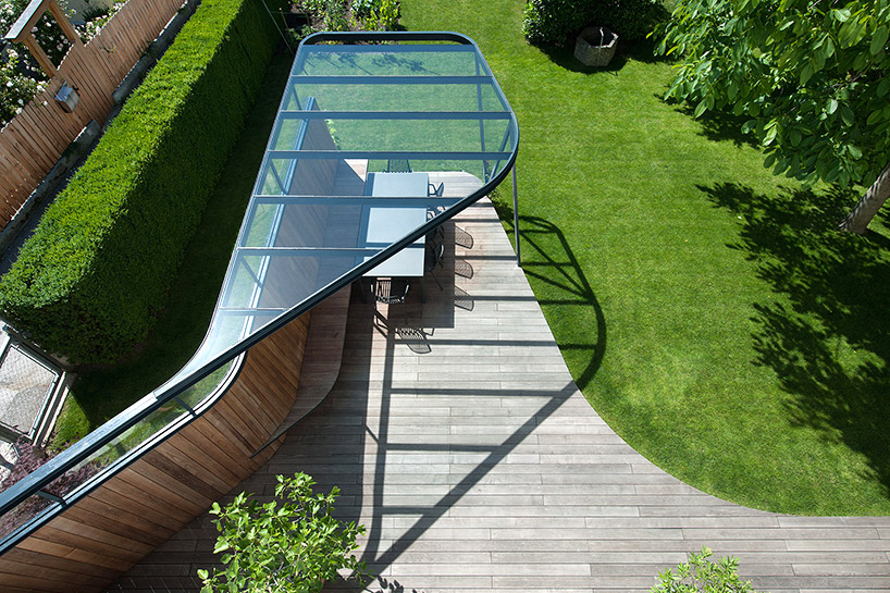 mario gasser constructs steel roofed terrace for austrian villa