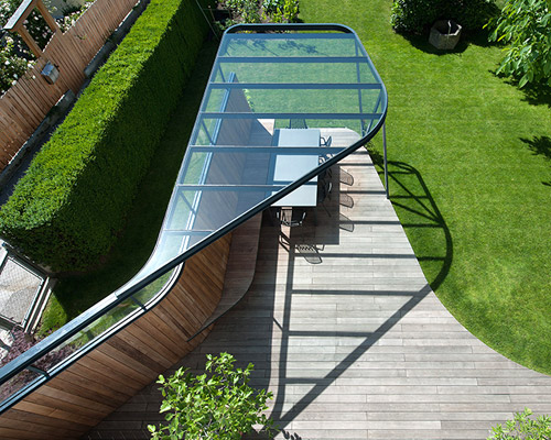 mario gasser constructs steel roofed terrace for austrian villa