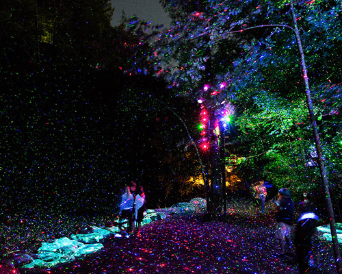 moment factory leads visitors on a nocturnal trail through an enchanted forest