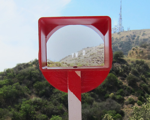 ordinary architecture situates falling hollywood letters along mount lee trail