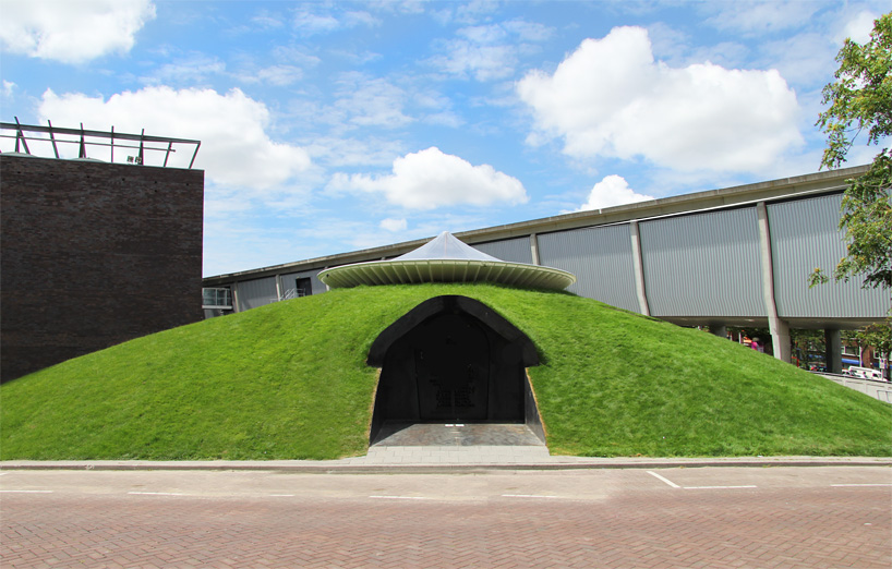 domed grass pavilion by SeARCH hides exotic rainforest retreat