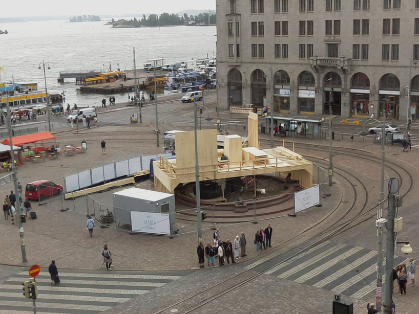tatzu nishi constructs hotel around helsinki's market square fountain