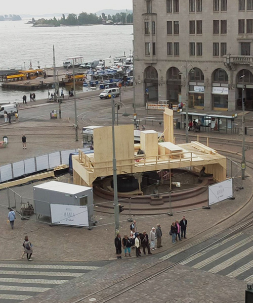 tatzu nishi constructs hotel around helsinki's market square fountain