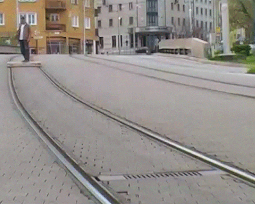 tomas moravec hacks a wooden pallet to glide down tram tracks