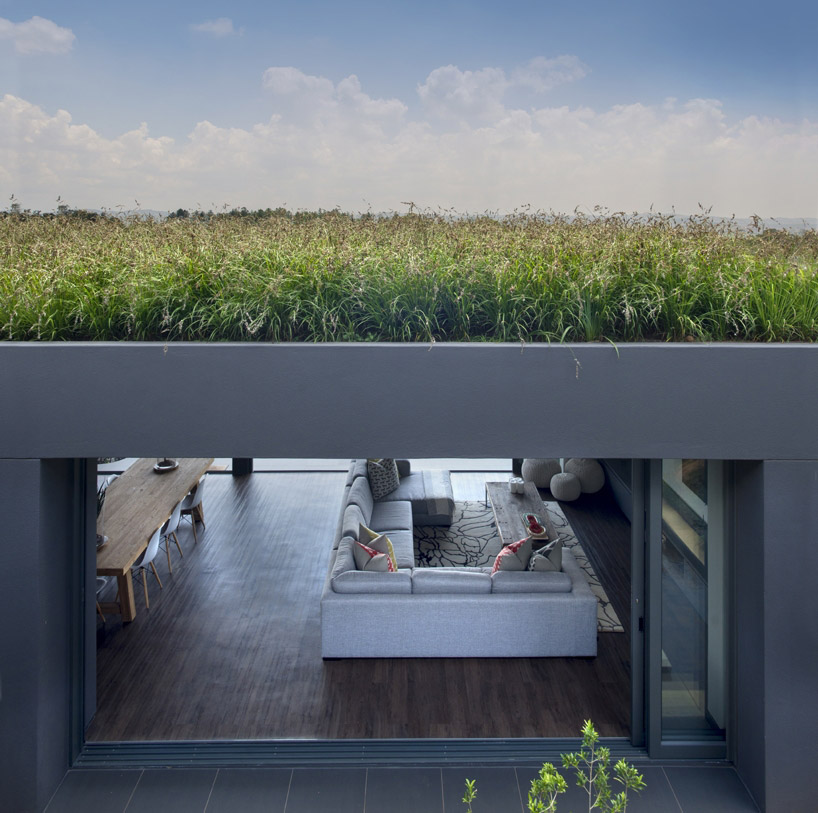 W design architecture studio blends house within the nature of africa