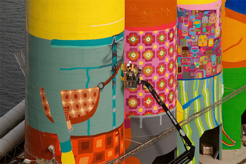 OSGEMEOS colorizes six giant silos on vancouver's granville island