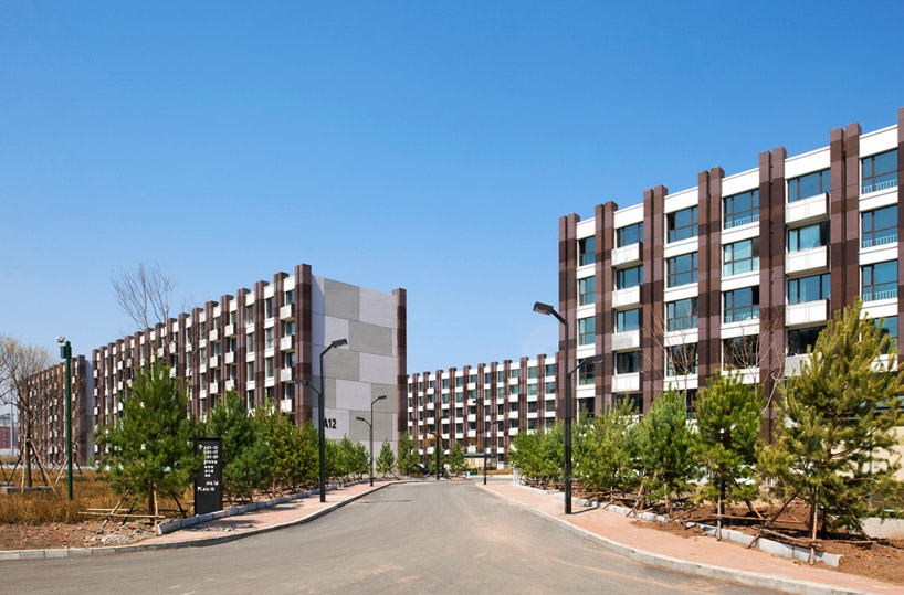 A-asterisk's left bank city places gymnasiums + villas along waterfront