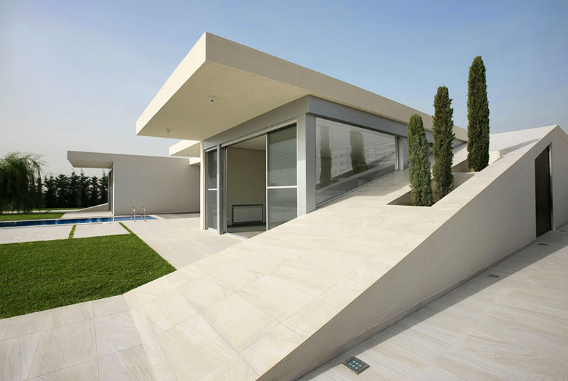 accent DG embeds jiyeh villa within lebanese landscape