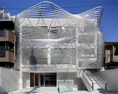 amano design transforms tokyo office with contorted façade