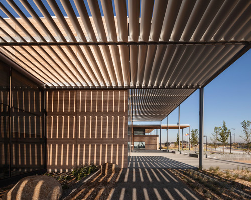 FJMT surrounds craigieburn library with shading louvers in australia