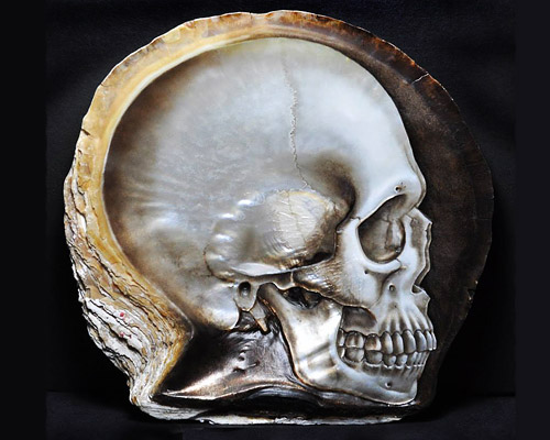 gregory raymond halili carves skulls into mother-of-pearl shells