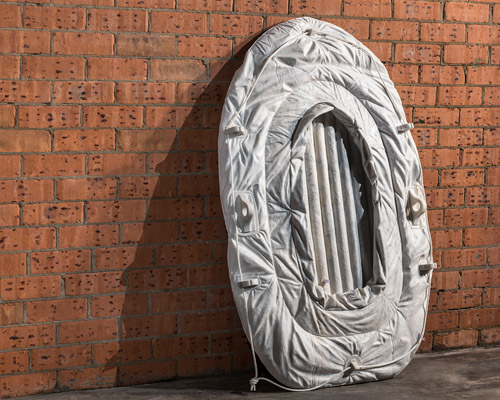 marble-carved inflatables by alex seton memorialize asylum seekers