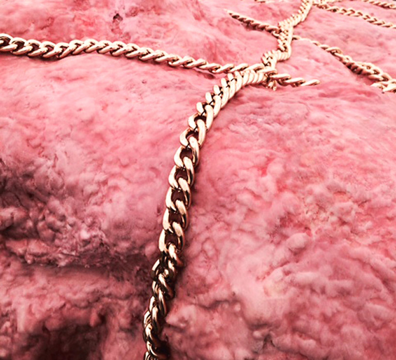 andrea hasler installs luxury flesh sculpture on the swiss mountains