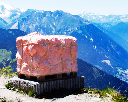 andrea hasler installs flesh sculptures on the swiss mountains