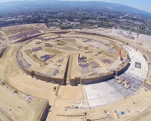 flying drone captures images of the apple campus under construction