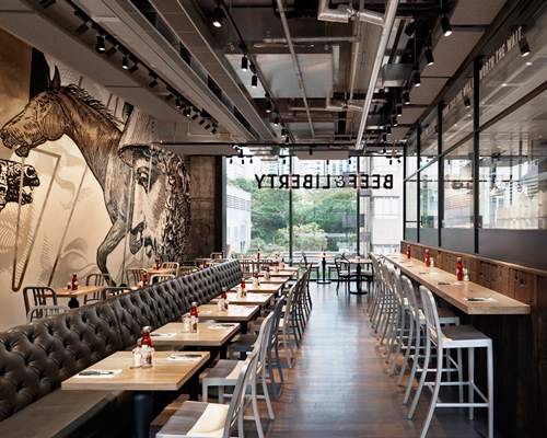 beef & liberty restaurant in hong kong features wall art by cyrcle