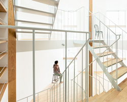 central staircase connects house in kamiosaki by comma design office