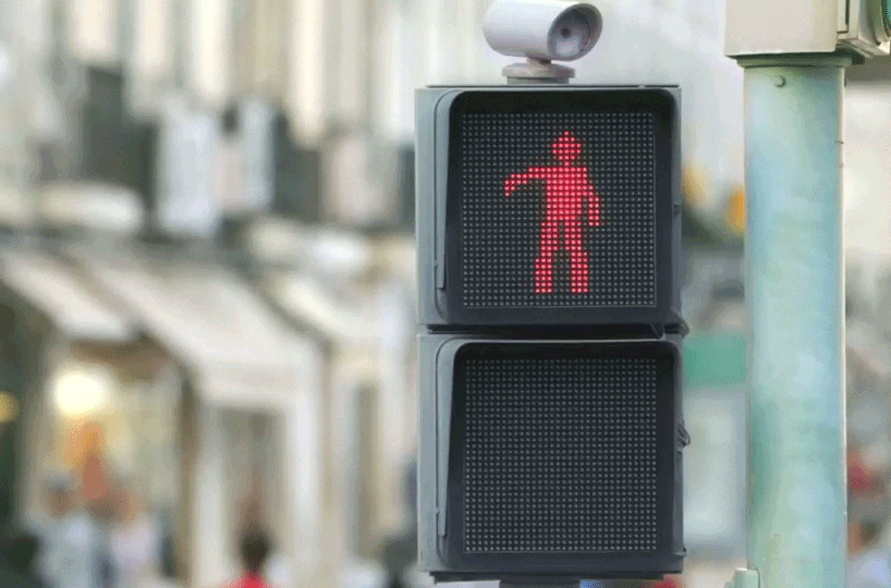 smart's dancing traffic light entertains waiting pedestrians
