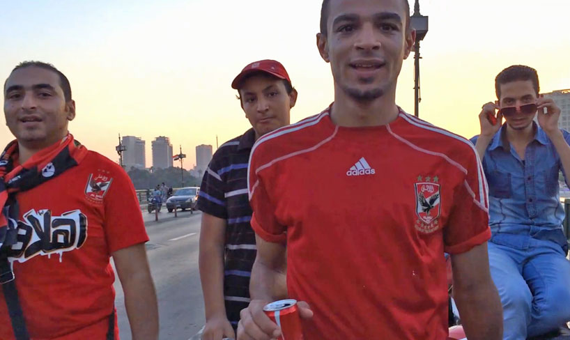 women film creepers on the bridge to show street harassment in egypt