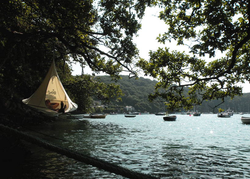 hang in out s cacoon hammock lifts you above the trees