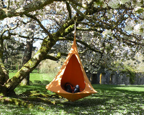hang-in-out's cacoon hammock lifts you above the trees