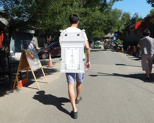 pedestrians wear architecture for instant hutong's interactive art piece