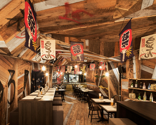 jean de lessard fits japanese restaurant with recycled timber