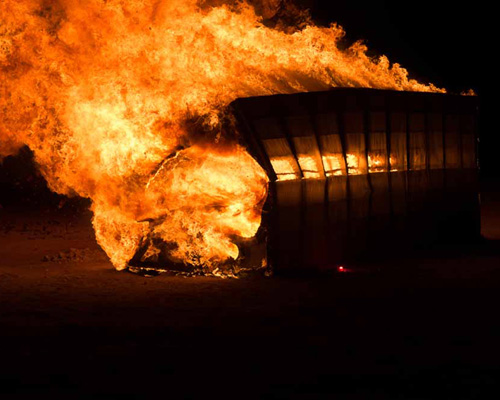 john lum architecture sets dining womb ablaze at burning man