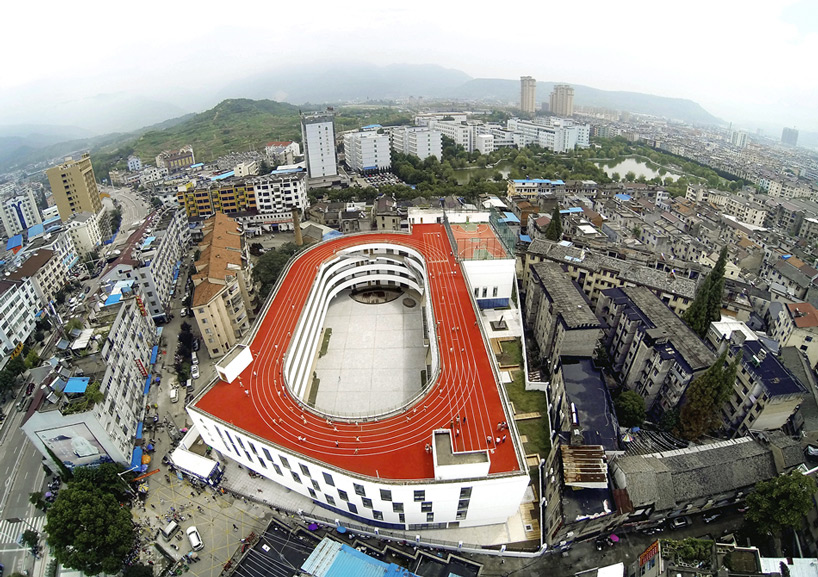 LYCS architecture shapes primary school with rooftop running track