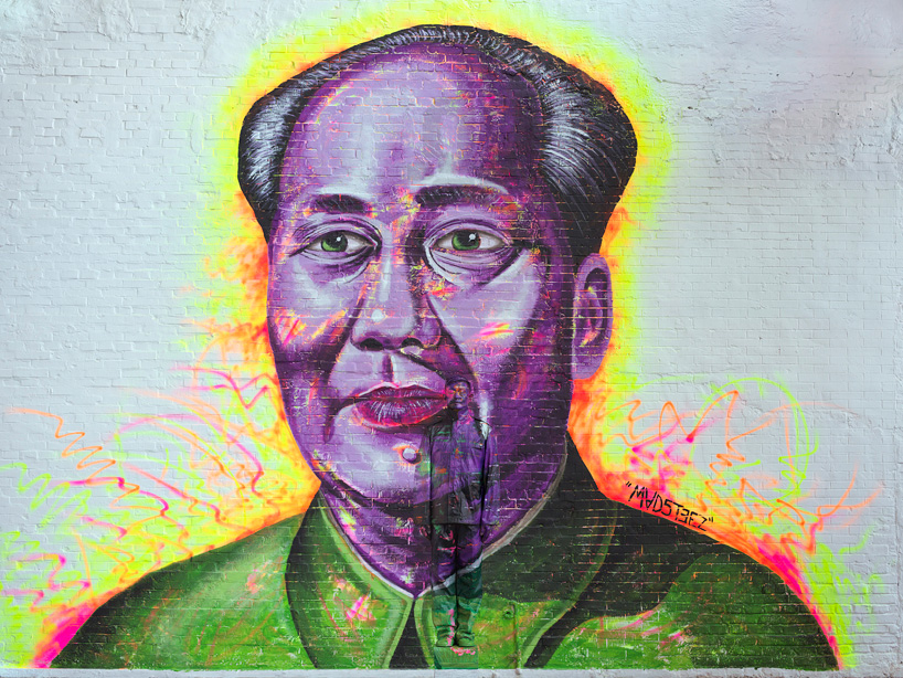 liu bolin camouflages himself in a colorful world at klein sun gallery