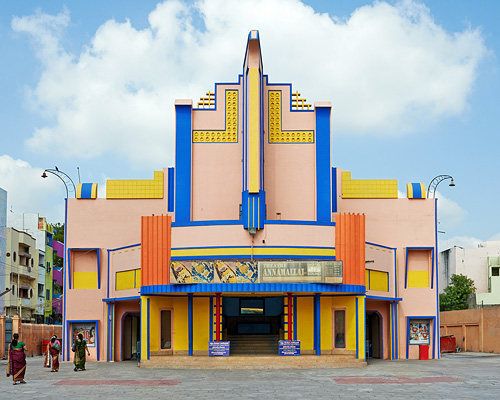 vibrant façades animate movie theater architecture in south india