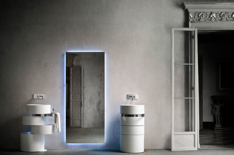 alessandro isola's orbit sink stacks swiveling rings of corian