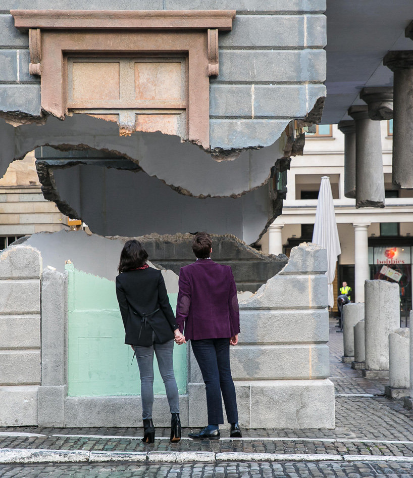 alex chinneck levitates covent garden’s market building in london