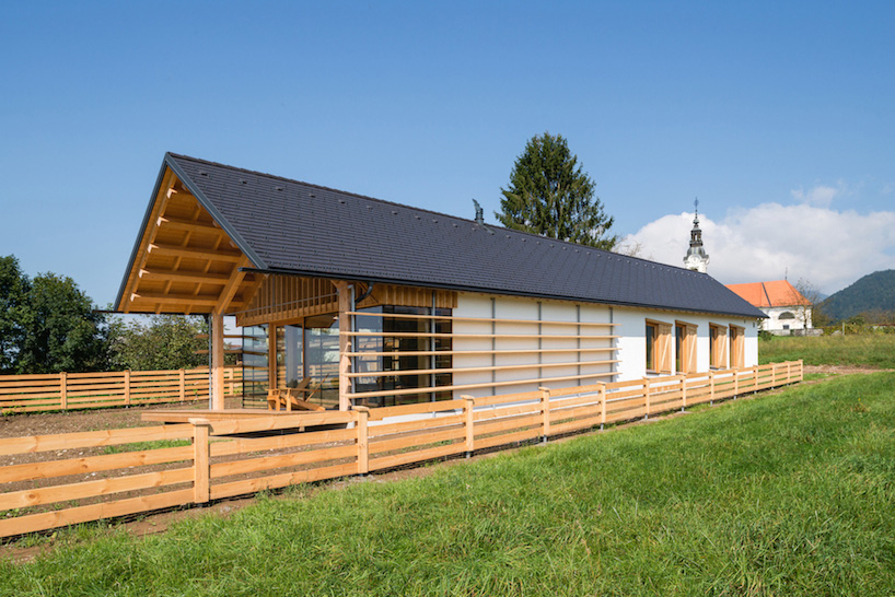 biro gasperic gently slopes spaces throughout wooden house in slovenia