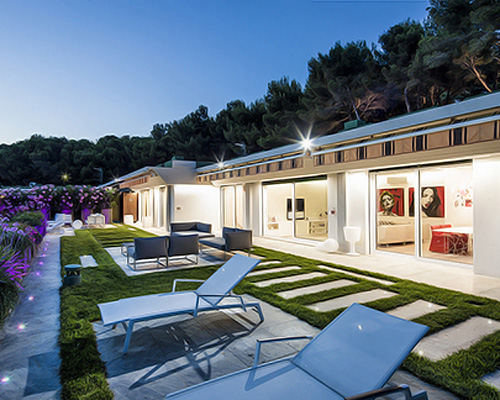 pinamare by building engineering renovates villas on italian beach