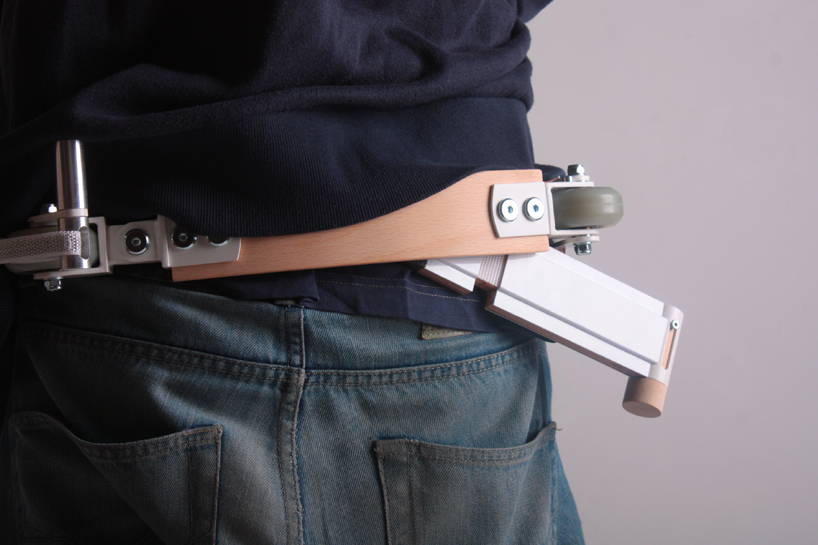 adam torok's collapsible belt-scooter is a wearable mode of transport