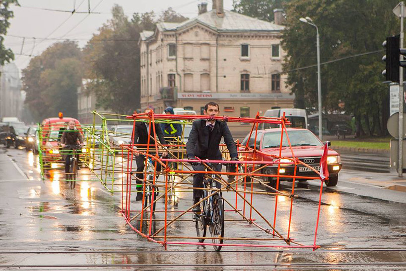 cyclists craft car skeletons to critique vehicle size on roads