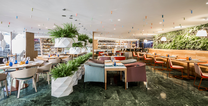 estudiHac's cheese bar for hotel melia features a vertical garden